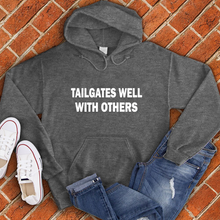 Load image into Gallery viewer, Tailgates Well With Others Hoodie
