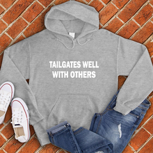 Load image into Gallery viewer, Tailgates Well With Others Hoodie
