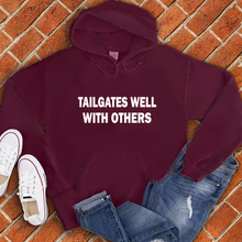 Load image into Gallery viewer, Tailgates Well With Others Hoodie
